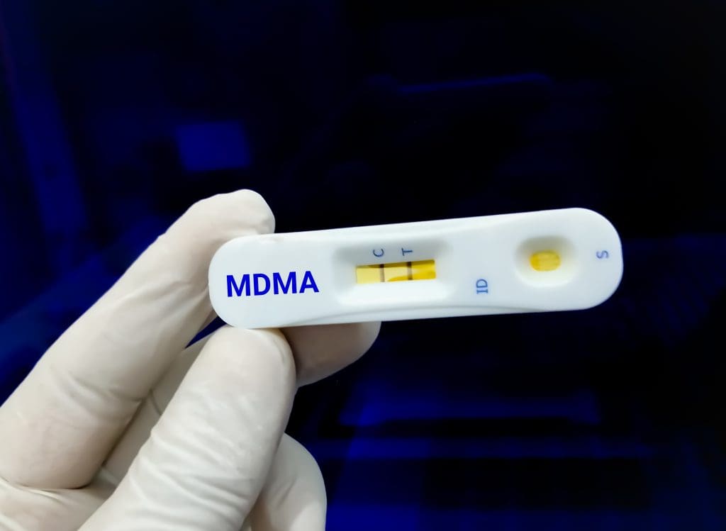 A lab test showing a positive result for MDMA